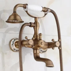Bathtub Filler Cold/Hot Water Mixer Clawfoot Antique Copper Finish Wall Mount Tub Filler with Hand Held Shower Faucet 2 Cross Handles with Tub Spout Vintage Style