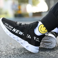 Kids' Black Breathable Mesh Running Sneakers with Lace-Up Design and Bold Letter Print - Comfortable Athletic Shoes for Boys