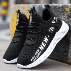 Kids' Black Breathable Mesh Running Sneakers with Lace-Up Design and Bold Letter Print - Comfortable Athletic Shoes for Boys