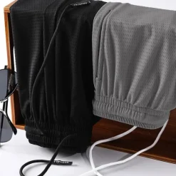 Men's Athletic Shorts Basketball Shorts Casual Shorts Mesh Shorts Pocket Drawstring Elastic Waist Plain Breathable Quick Dry Knee Length Casual Daily Fashion Streetwear Black White