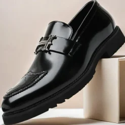 Men's Black and Gold Slip-On Loafers with Decorative Buckle and Brogue Detailing – Stylish Formal Shoes for Office and Special Occasions