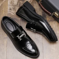 Men's Black and Gold Slip-On Loafers with Decorative Buckle and Brogue Detailing – Stylish Formal Shoes for Office and Special Occasions