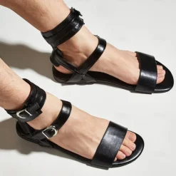 Men's Black Gladiator Sandals – Faux Leather Ankle Strap Flat Sandals with Buckle Closure for Summer Fashion, Beachwear, and Festivals