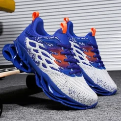 Men's Blue Athletic Sneakers with Unique Hollow Sole Design, Breathable Knit Upper, and Flame Detail – Lightweight Running Shoes with Orange Accents
