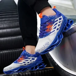 Men's Blue Athletic Sneakers with Unique Hollow Sole Design, Breathable Knit Upper, and Flame Detail – Lightweight Running Shoes with Orange Accents