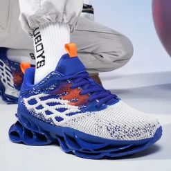 Men's Blue Athletic Sneakers with Unique Hollow Sole Design, Breathable Knit Upper, and Flame Detail – Lightweight Running Shoes with Orange Accents