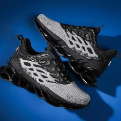 Men's Blue Athletic Sneakers with Unique Hollow Sole Design, Breathable Knit Upper, and Flame Detail – Lightweight Running Shoes with Orange Accents