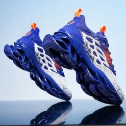 Men's Blue Athletic Sneakers with Unique Hollow Sole Design, Breathable Knit Upper, and Flame Detail – Lightweight Running Shoes with Orange Accents