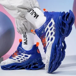 Men's Blue Athletic Sneakers with Unique Hollow Sole Design, Breathable Knit Upper, and Flame Detail – Lightweight Running Shoes with Orange Accents