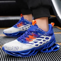 Men's Blue Athletic Sneakers with Unique Hollow Sole Design, Breathable Knit Upper, and Flame Detail – Lightweight Running Shoes with Orange Accents