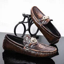 Men's Crocodile Pattern Faux Leather Loafers – Luxury Slip-On Dress Shoes with Metal Lion Decor for Formal and Casual Occasions