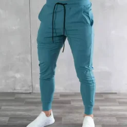 Men's Joggers Sweatpants Drawstring Zipper Pocket Bottoms Athleisure Winter Breathable Soft Sweat wicking Fitness Basketball Running Regular Fit Sportswear Activewear Solid Colored Black White Blue