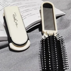 Mini Folding Hair Brush with Mirror - Portable Anti-Static Massage Comb for Travel, Head Massage, and Female Hair Care