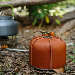 1pc Outdoor Camping Flat Gas Cylinder Leather Cover, Durable Protective Case, Weather-Resistant, Stylish and Practical, Safeguards Gas Cylinder from Scratches and Damage, Ideal for Outdoor Camping and Picnics