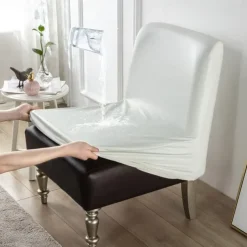 1Pc PU Waterproof Solid Color Stretch Armless Chair Cover - Durable PU Leather Slipcover for Single Oversized Chairs - Ideal for Home and Hotel Furniture Protection