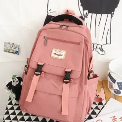 Pink Waterproof School Bags Nylon Backpack with Plush Monkey Keychain - Stylish and Durable School Bag with Multiple Pockets for Travel and Everyday Use