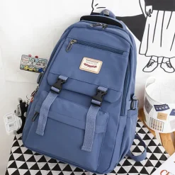 Pink Waterproof School Bags Nylon Backpack with Plush Monkey Keychain - Stylish and Durable School Bag with Multiple Pockets for Travel and Everyday Use