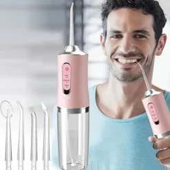 Portable Rechargeable Electric Teeth Irrigator with 4 Green Heads - Effective Oral Dental Seam Washer for Men and Women Perfect for Water Flossing and Cleaning