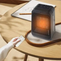 Space Heater 1200W Electric Heater Indoor Portable Thermostat PTC Fast Heating Chamber Small Heater with Heating and Fan Mode