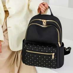 Women's Black Quilted Nylon Backpack with Gold Zippers and Studded Front Pocket – Stylish Lightweight Bag for School, Work, or Daily Use