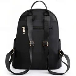 Women's Black Quilted Nylon Backpack with Gold Zippers and Studded Front Pocket – Stylish Lightweight Bag for School, Work, or Daily Use