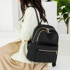 Women's Black Quilted Nylon Backpack with Gold Zippers and Studded Front Pocket – Stylish Lightweight Bag for School, Work, or Daily Use