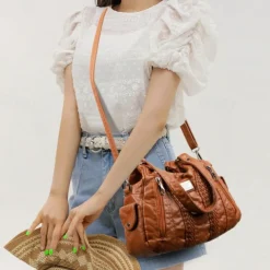 Women's Brown Quilted Faux Leather Handbag – Stylish Zippered Tote with Braided Detailing & Adjustable Strap for Work, Travel & Casual Outings