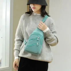 Women's Fashionable Sling Bag with Multiple Zippers and Adjustable Strap - Trendy, Lightweight Crossbody Bag for Casual & Travel Use