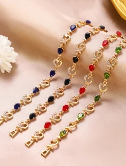 Women's Gold Bracelet with Red Teardrop Crystals and Heart-Shaped Accents, Elegant Romantic Design for Valentine's Day Gift, Weddings, and Special Occasions