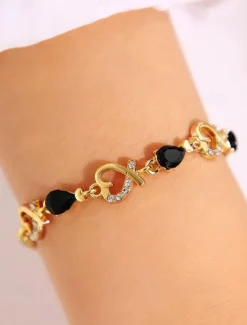 Women's Gold Bracelet with Red Teardrop Crystals and Heart-Shaped Accents, Elegant Romantic Design for Valentine's Day Gift, Weddings, and Special Occasions