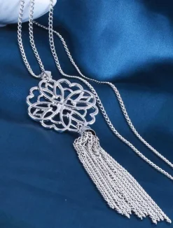 Women's Gold Long Pendant Necklace with Intricate Floral Design and Tassel Accent - Elegant Statement Jewelry for Casual and Formal Outfits