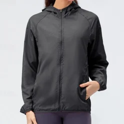 Women's hooded jacket with zipper pockets hood with multiple pockets waterproof fabric women's skin jacket