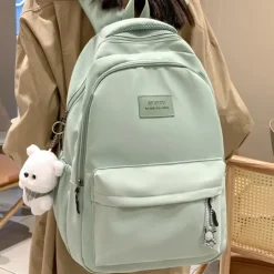 Women's Light Green School Backpack with Cute Plush Bear Keychain, Large Capacity Multi-Pocket Waterproof Bookbag for Teen Girls, College, and Daily Use