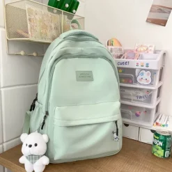 Women's Light Green School Backpack with Cute Plush Bear Keychain, Large Capacity Multi-Pocket Waterproof Bookbag for Teen Girls, College, and Daily Use