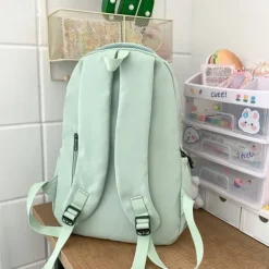 Women's Light Green School Backpack with Cute Plush Bear Keychain, Large Capacity Multi-Pocket Waterproof Bookbag for Teen Girls, College, and Daily Use