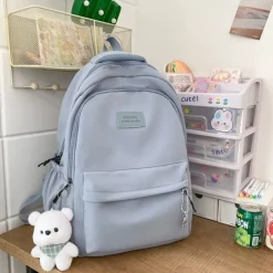 Women's Light Green School Backpack with Cute Plush Bear Keychain, Large Capacity Multi-Pocket Waterproof Bookbag for Teen Girls, College, and Daily Use