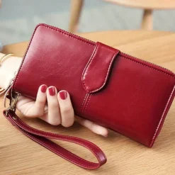 Women's RFID Blocking Faux Leather Wallet - Multi-Compartment Zipper Clutch with Card Slots, Phone Holder, and Wristlet Strap for Travel and Everyday Use