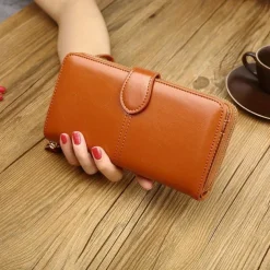 Women's RFID Blocking Faux Leather Wallet - Multi-Compartment Zipper Clutch with Card Slots, Phone Holder, and Wristlet Strap for Travel and Everyday Use