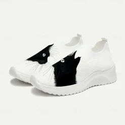Women's White Slip-On Sneakers with Black Cat Print - Breathable Flyknit Casual Shoes for Everyday Comfort and Style